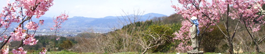 お春地蔵と春の風景